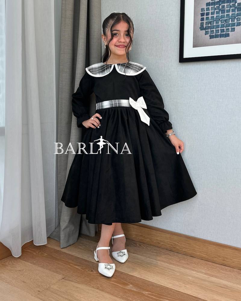 Girls' black dress with a checkered collar