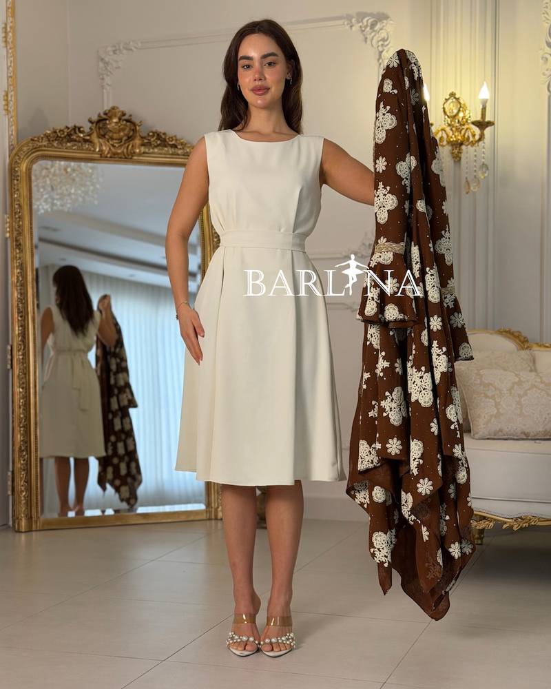 Off-White jalabiya with an Embellished Brown Abaya