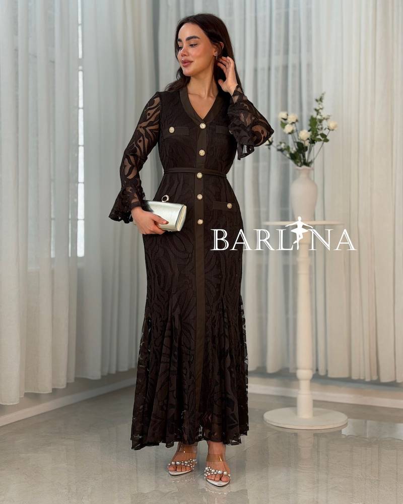 Elegant brown dress adorned with gold buttons