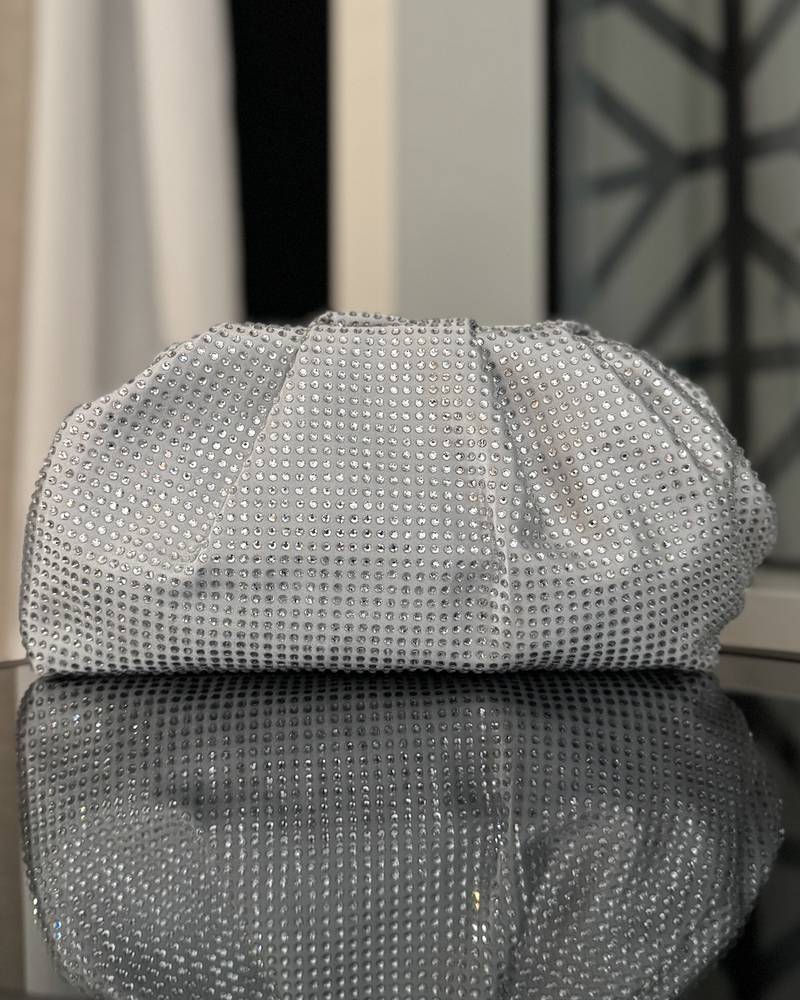 Shiny puffy clutch-style bag