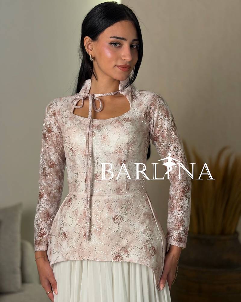 Pink lace dress with a soft bow tie