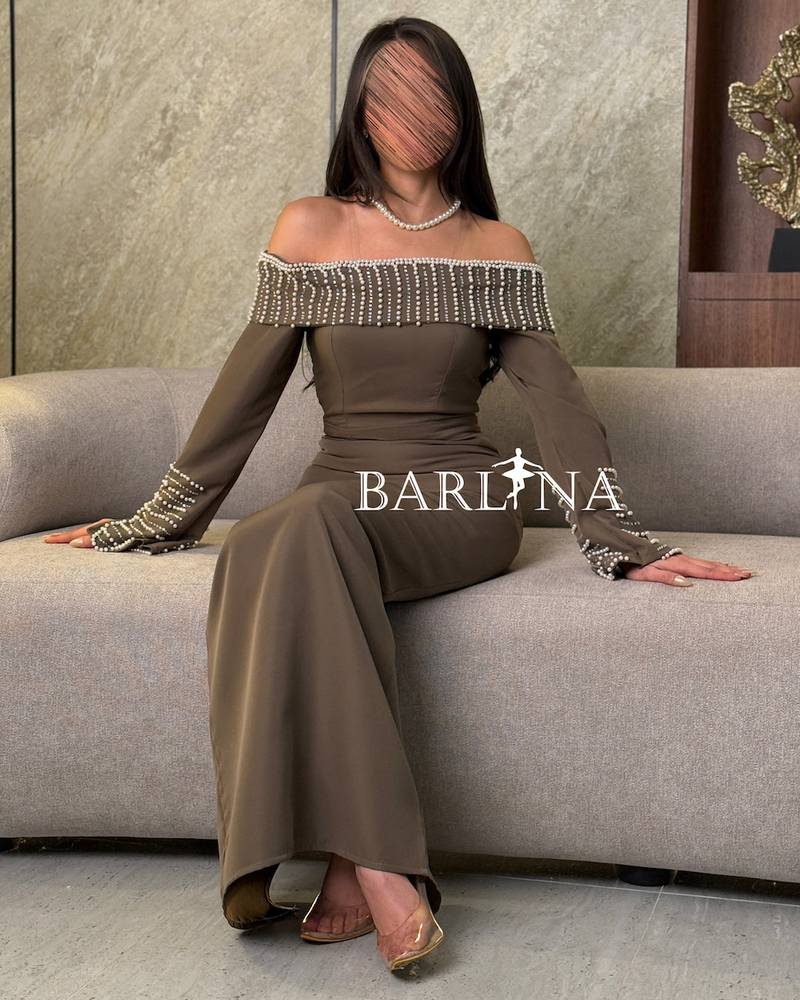Brown dress decorated with shiny beads