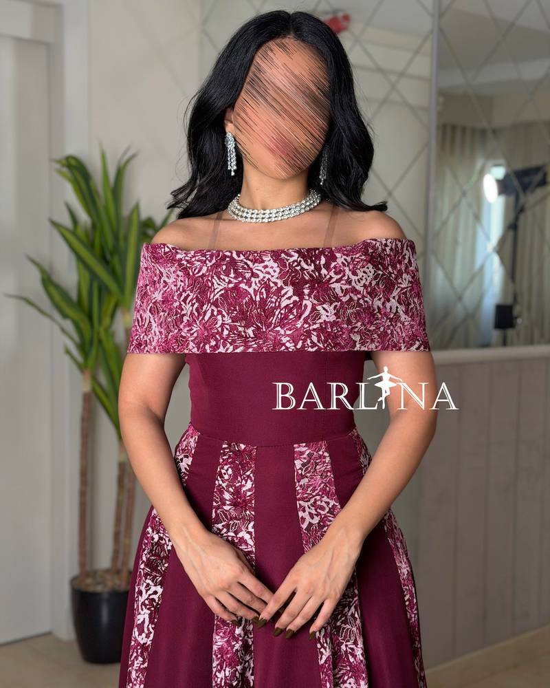 Off-shoulder burgundy dress embroidered with delicate patterns