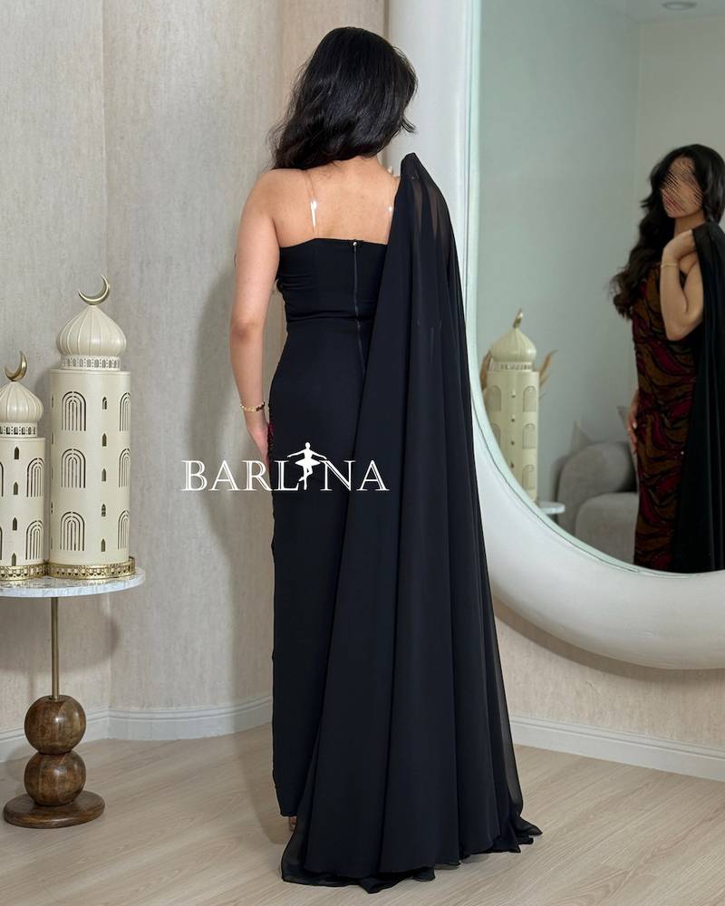 Jalabiya with artistic patterns in shades of brown and burgundy