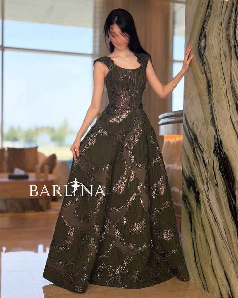 Luxurious olive evening dress with intricate embroidery
