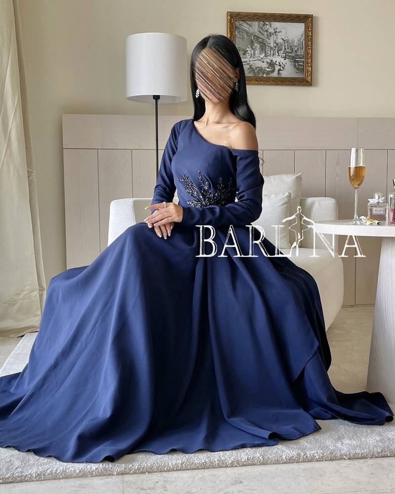 One-shoulder navy blue dress with long sleeves