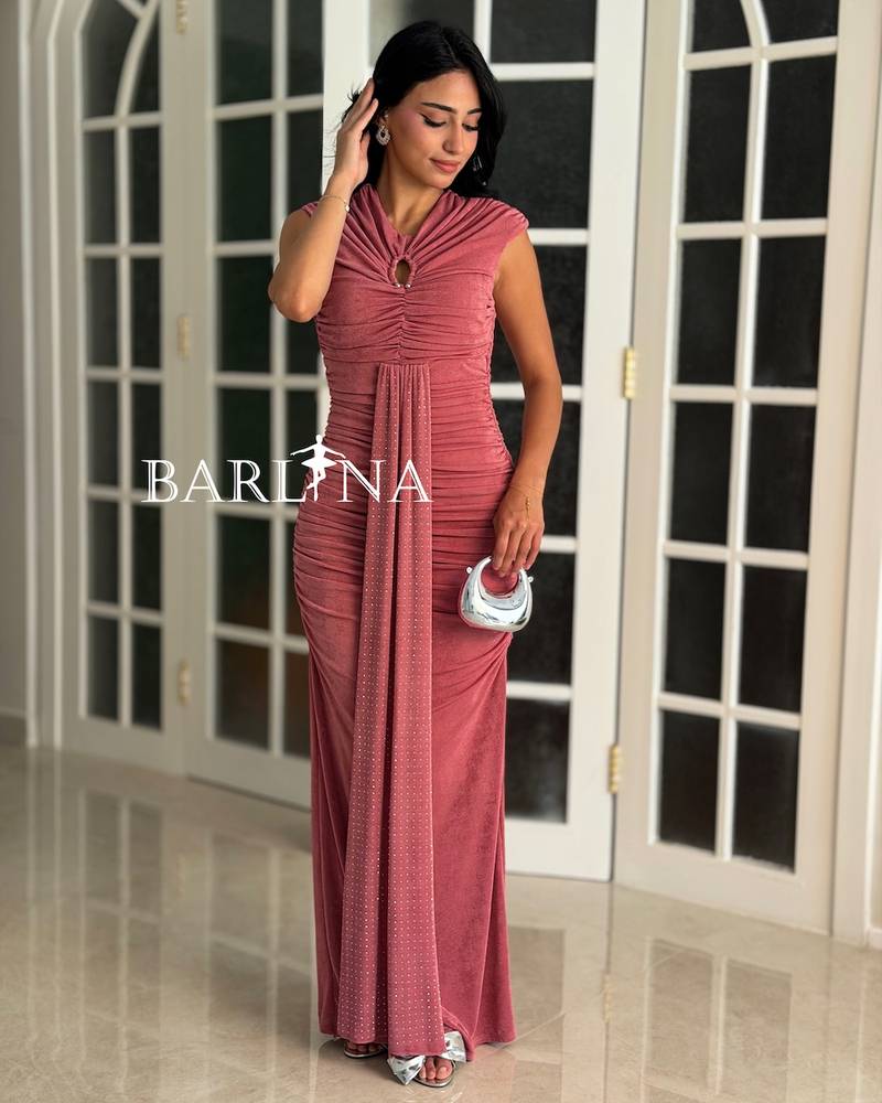 Pink fitted dress with a train in the front