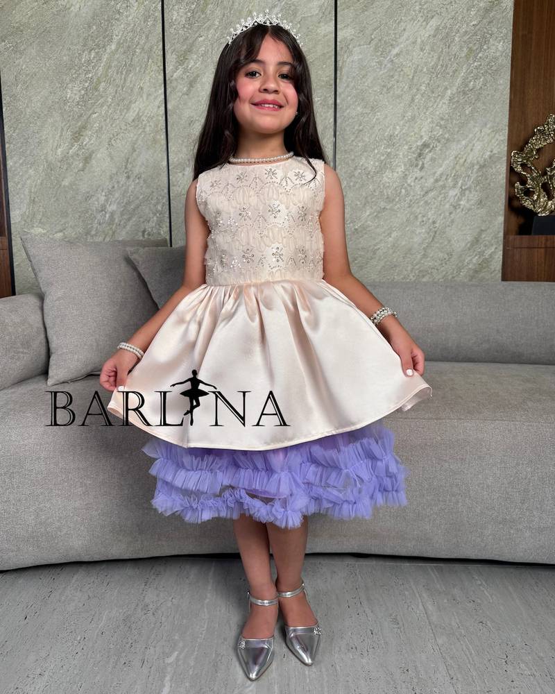 Girls' beige dress with a purple tulle layer