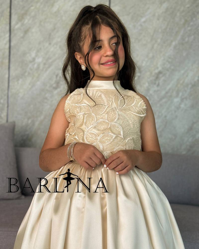 Beige girls' dress with raised embroidery
