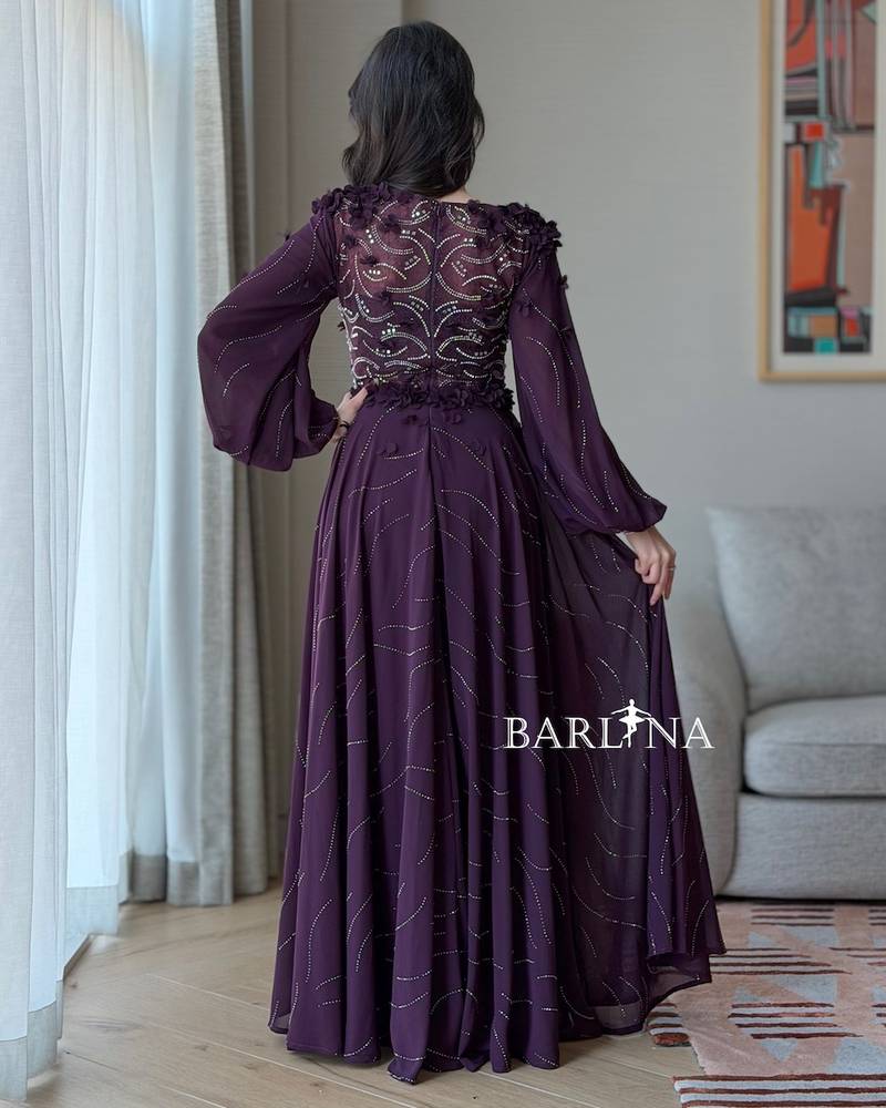 A purple flared dress embroidered with silver beads