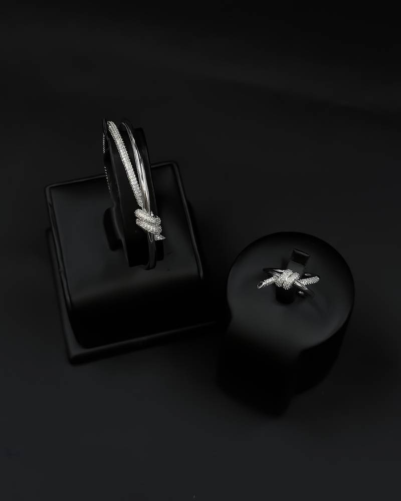 A delicate bracelet and ring with a wrap design