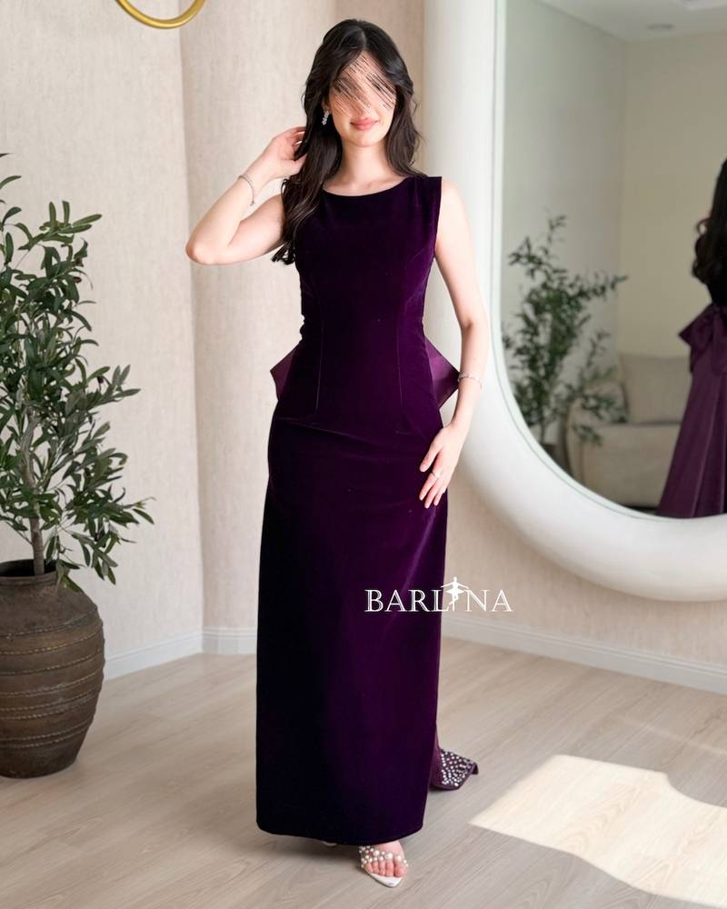 Dark purple velvet dress with a bow train