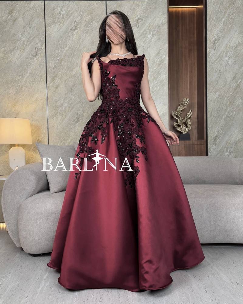 Burgundy evening dress with a wide collar and no sleeves