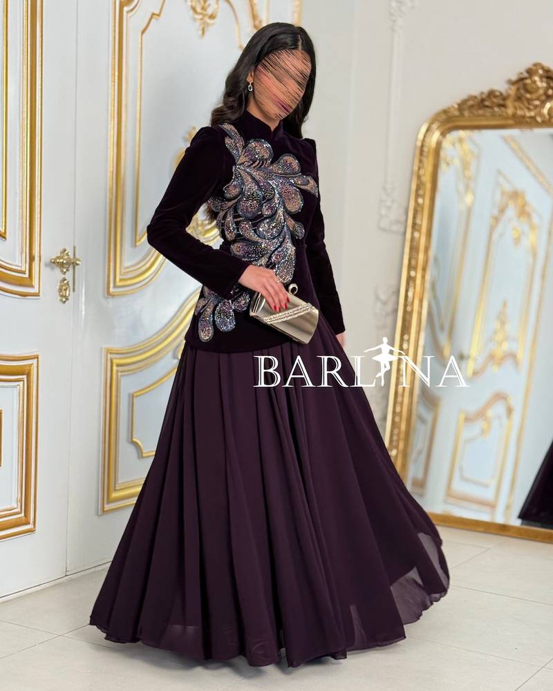 Long dark purple dress with luxurious embroidery