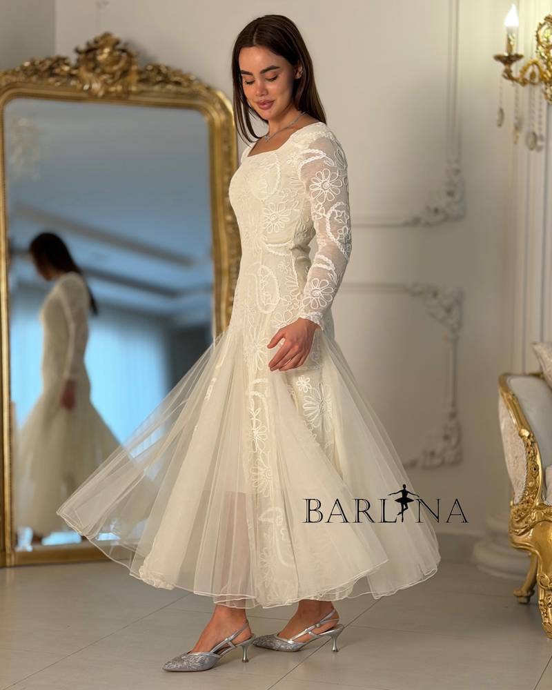 Soft white tulle dress with lace embroidery