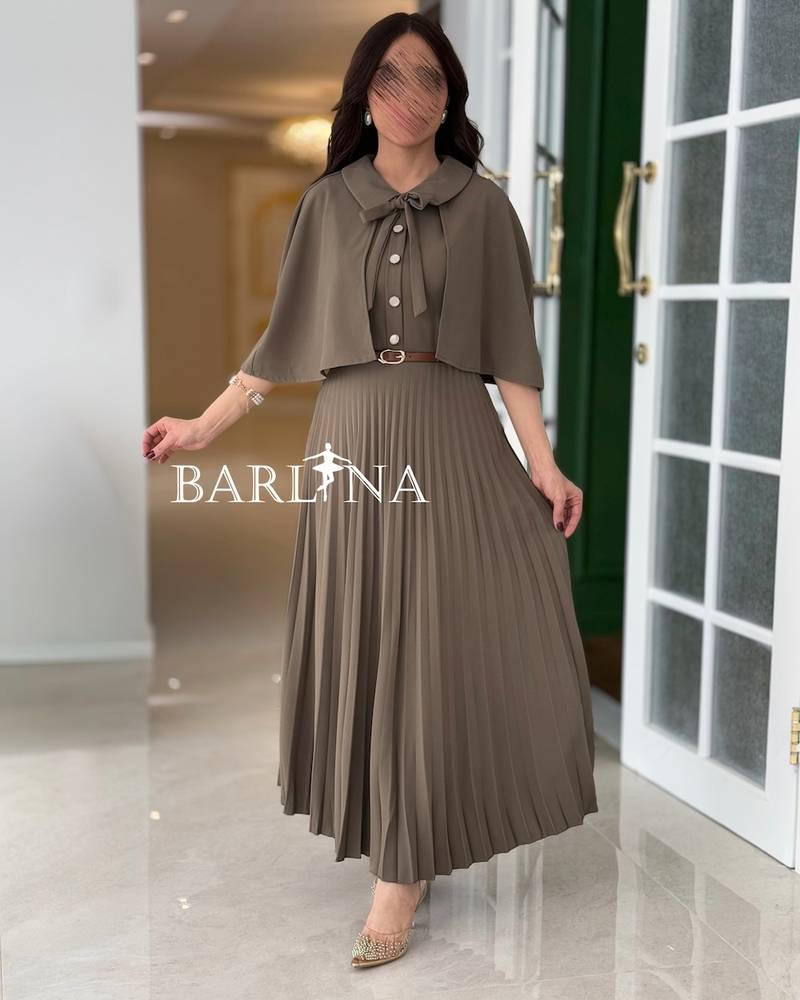 Beige pleated dress with a short flowing cape