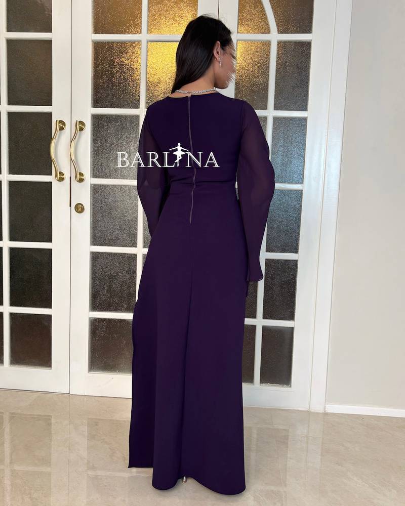 A soft purple dress with delicate side pleats
