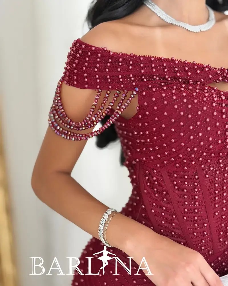 Burgundy evening dress fully embellished with pearls