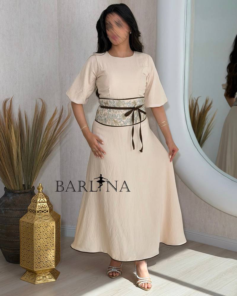 Soft beige jalabiya adorned with an embroidered belt