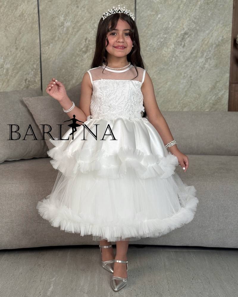 Girls' white dress with embroidery and ruffle details