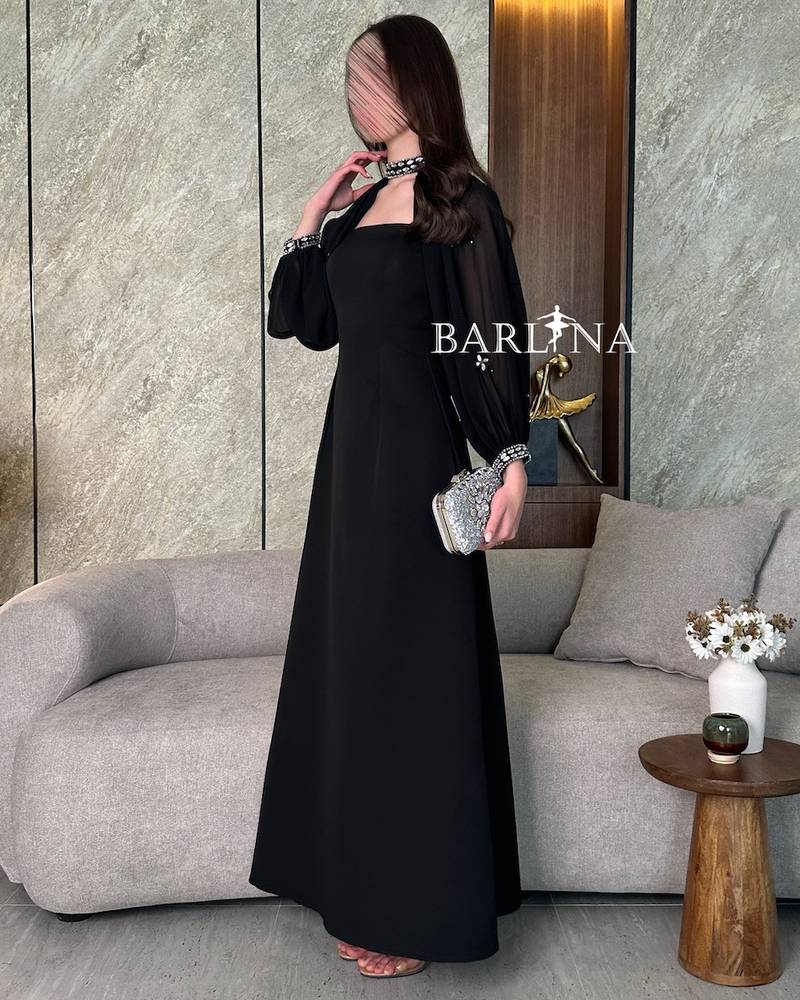 Luxury black dress with sheer sleeves