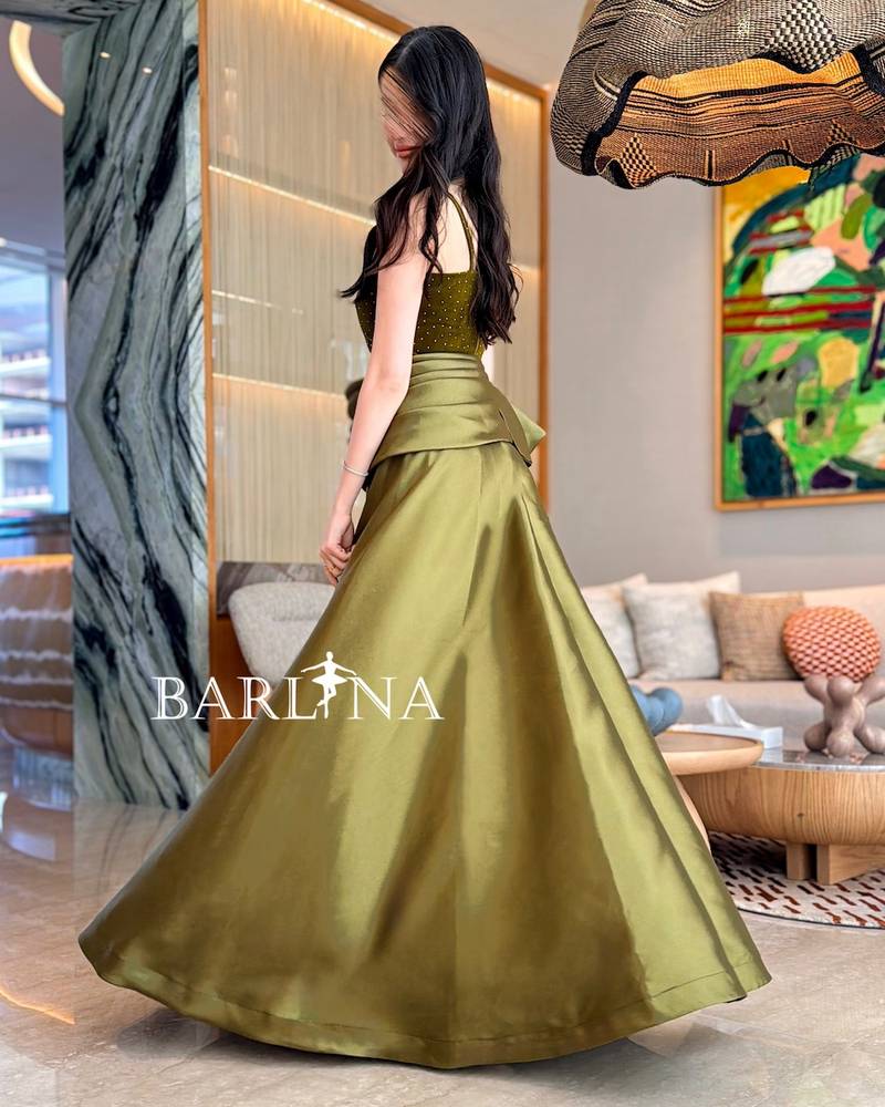 Olive green evening dress with a velvet bodice