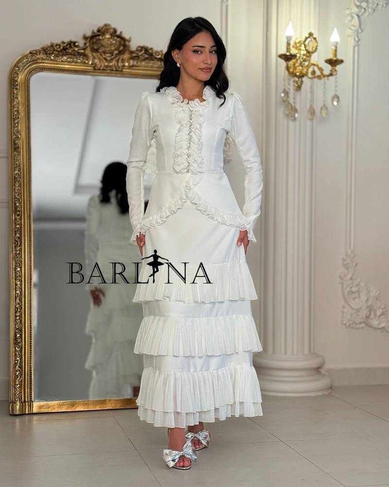 Long white set with soft ruffle details
