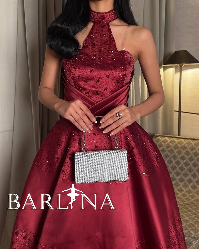 Burgundy evening dress with sequins and halter neck