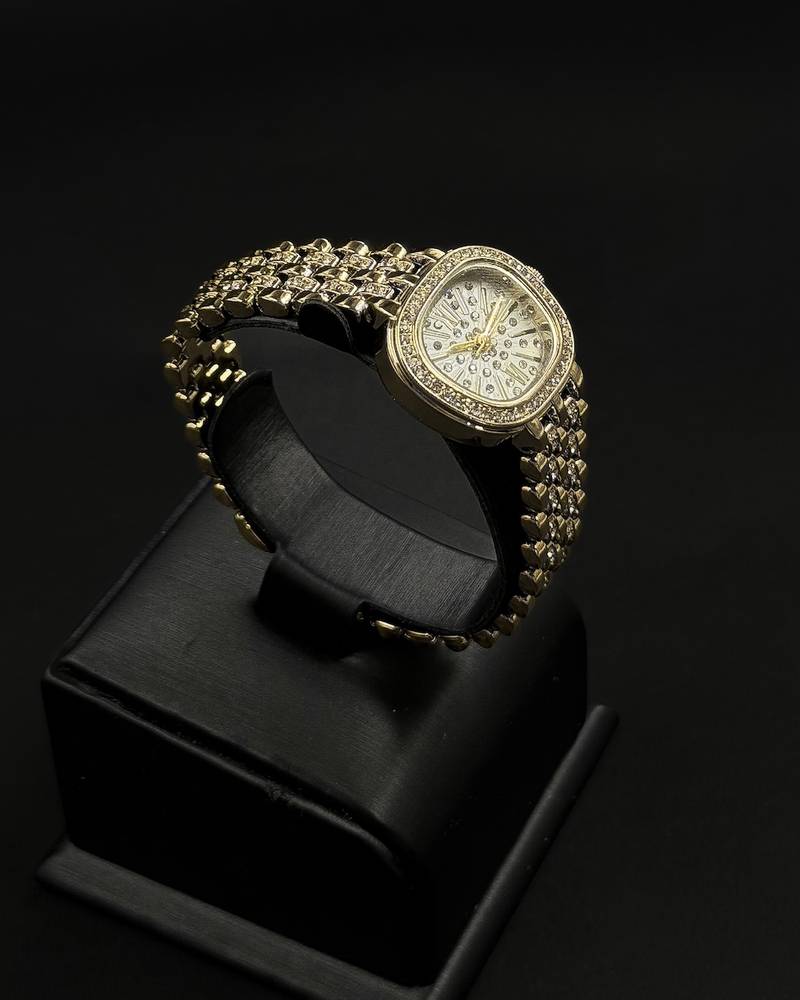 A dazzling women's watch fully studded