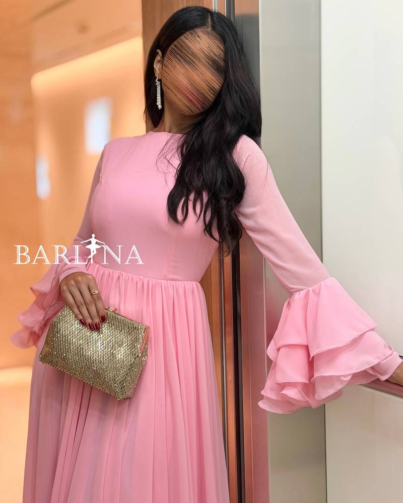 Pink dress with layered sleeves and open back