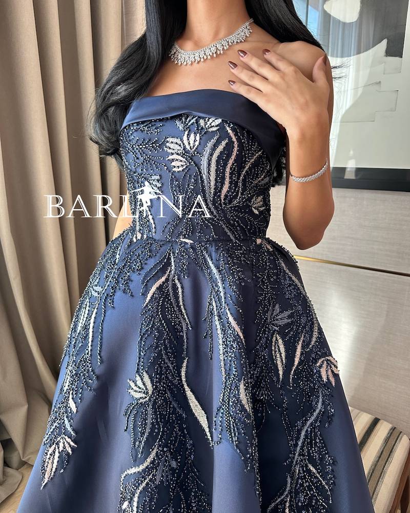 Navy blue embroidered dress with straight neckline