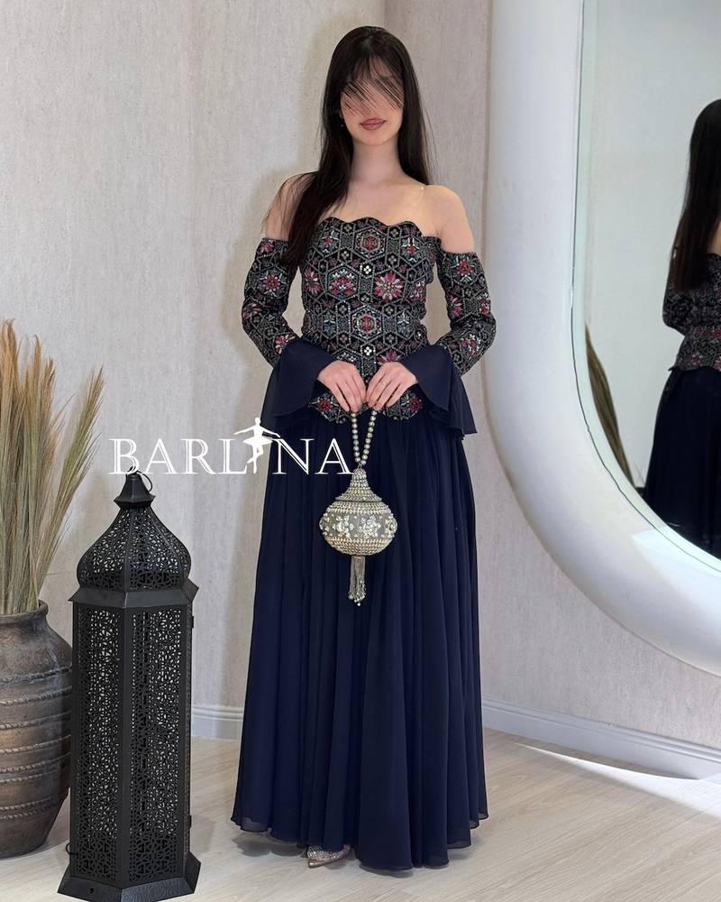 Off-shoulder navy jalabiya with an embroidered top