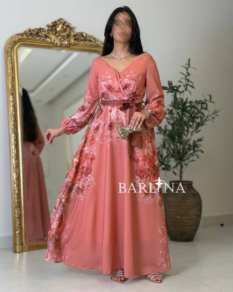 Pink floral dress with a V-neck and belt