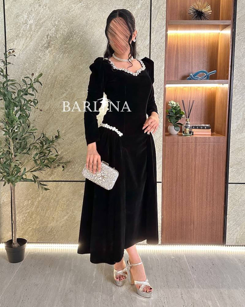 Black velvet dress with crystal embellishment
