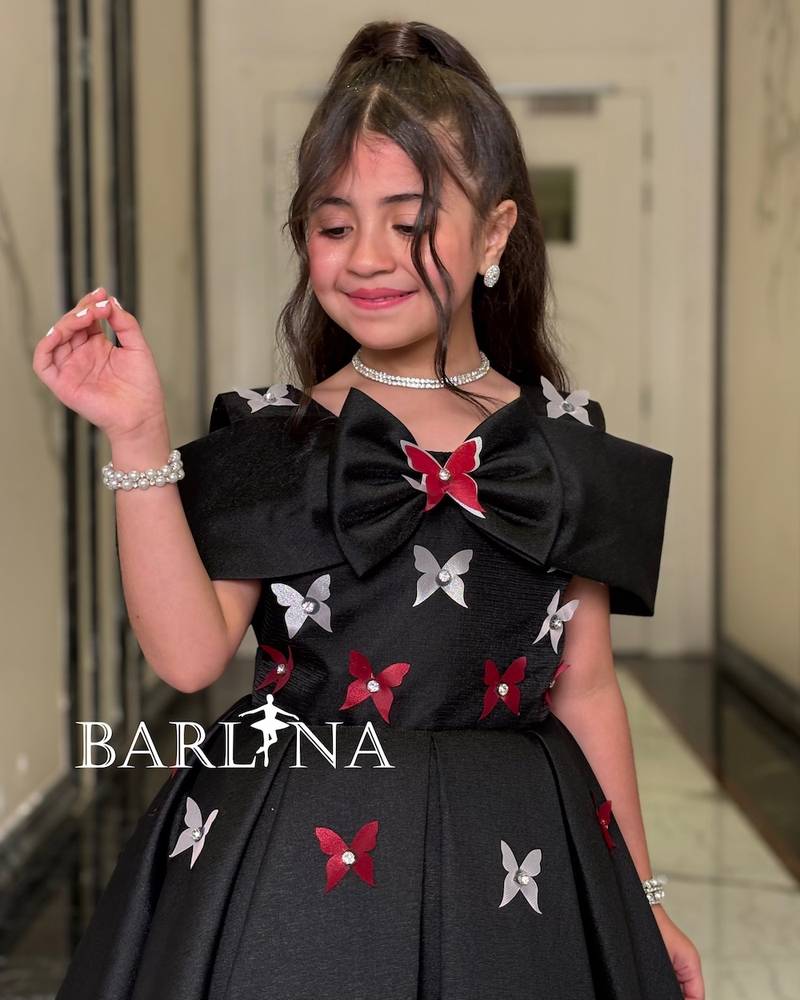 Girls' black off-shoulder dress with butterflies