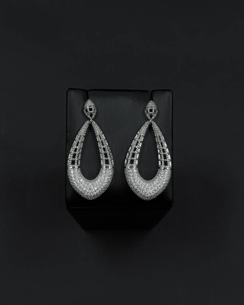 Large oval hollow design earrings