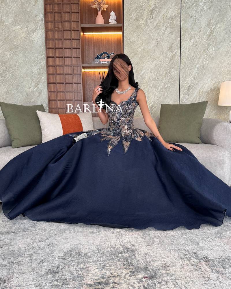 Navy blue evening dress with floral embroidery