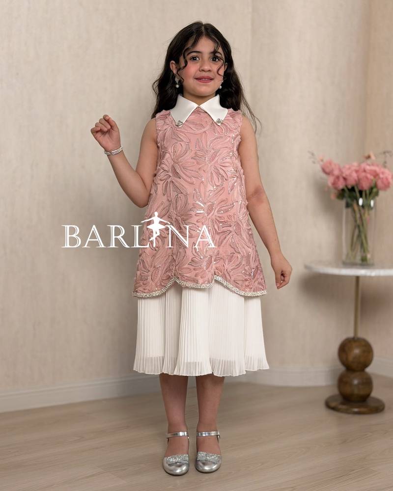 Soft pink girl's dress with a white collar