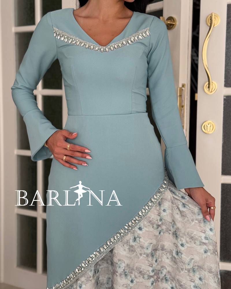 Sky blue dress with shimmering details at the chest