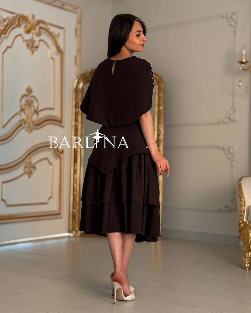 Brown midi dress with a short embellished cape