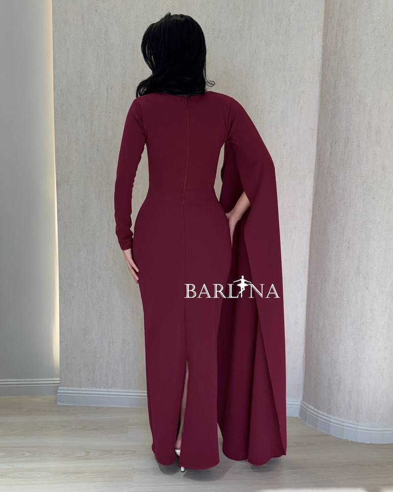 Burgundy dress with a simple design and long sleeves