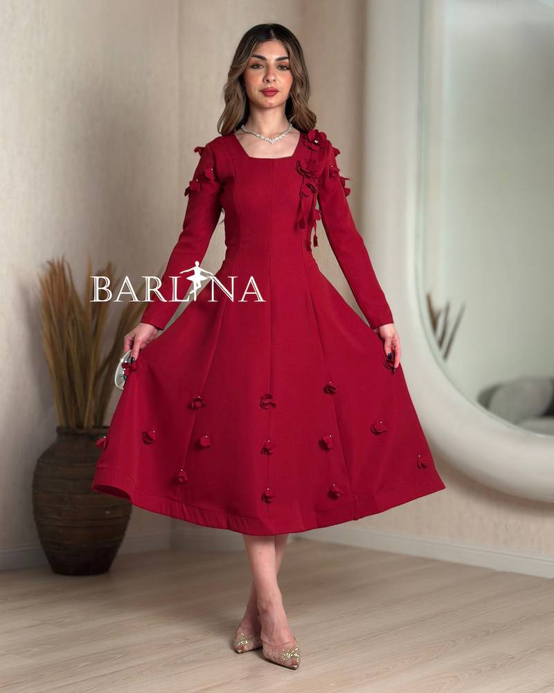 Red midi dress with floral details