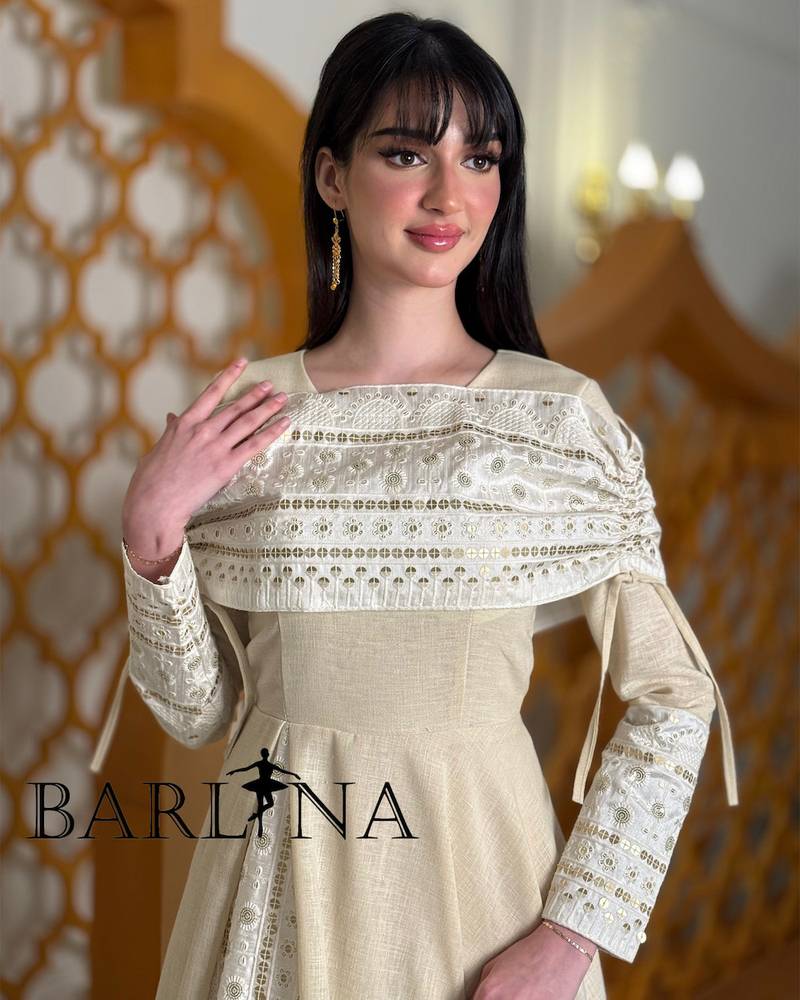 Soft off-white jalabiya with elegant traditional embroidery