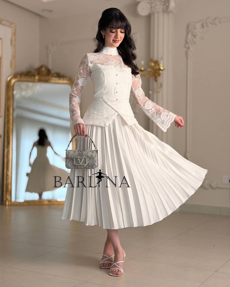 White dress with lace and soft pleats