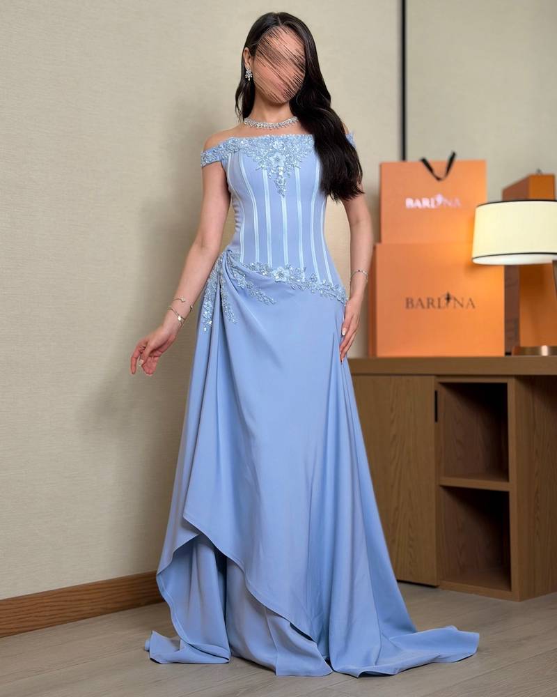 Draped evening dress with a fitted corset silhouette