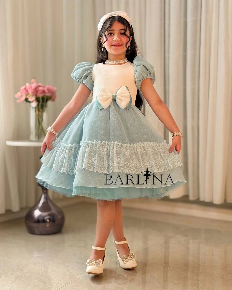 Elegant Tiffany-style girls' dress with a lace trim