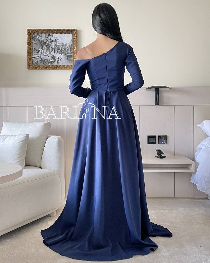 One-shoulder navy blue dress with long sleeves