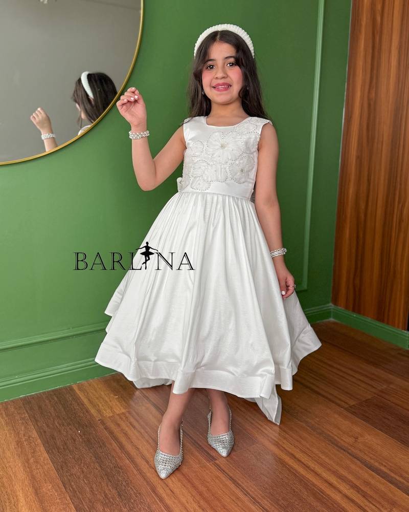 Girls' white dress with open back design