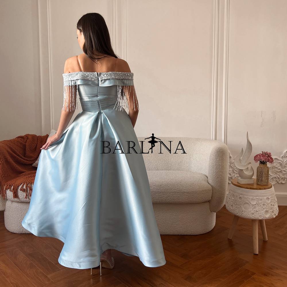 Blue dress decorated with beads