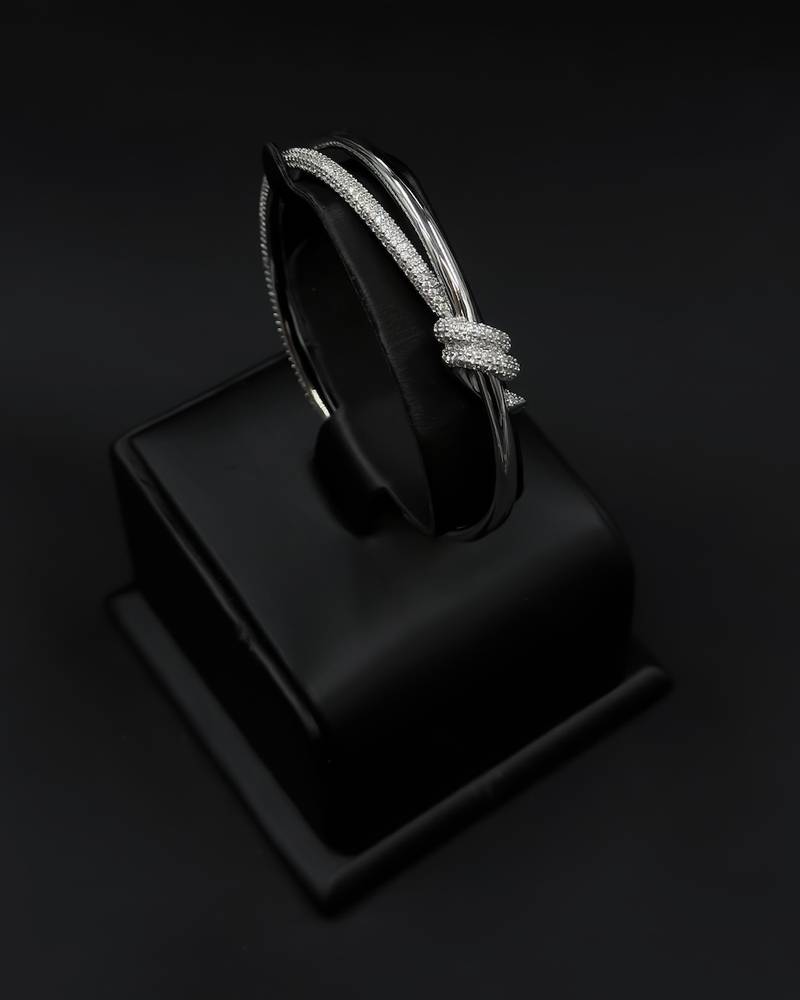 A delicate bracelet and ring with a wrap design